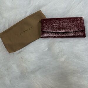 BURBERRY 
Patent Glitter Porter Continental Wallet
Sold Out in stores